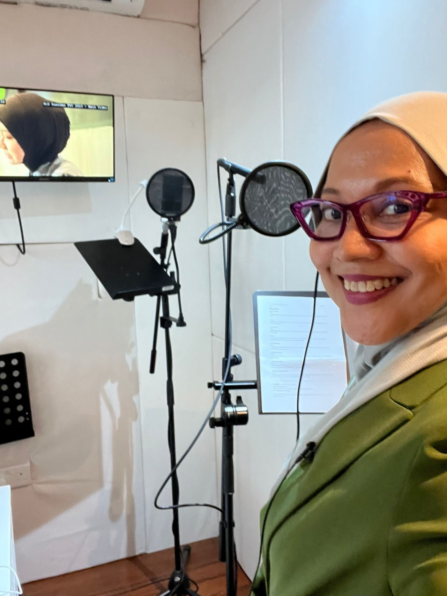 Haslinda Ali in a recording studio during voice-over work