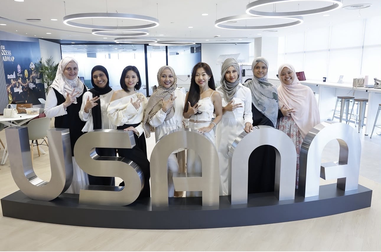 Haslinda Ali with women at the USANA office
